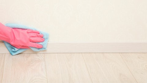 Clean baseboard and wall